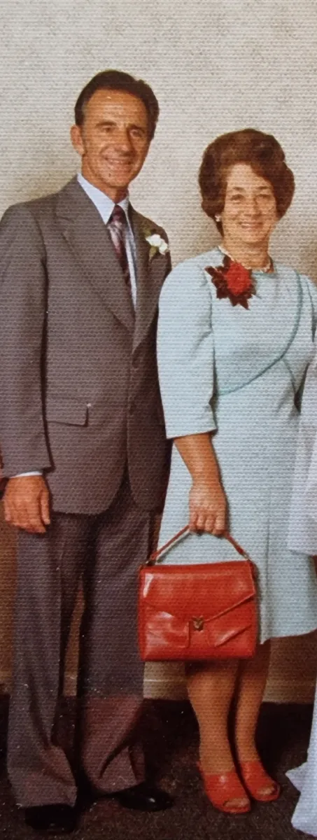 Colour photograph of Uncle Ross and Nana Dunn, dressed up and smiling